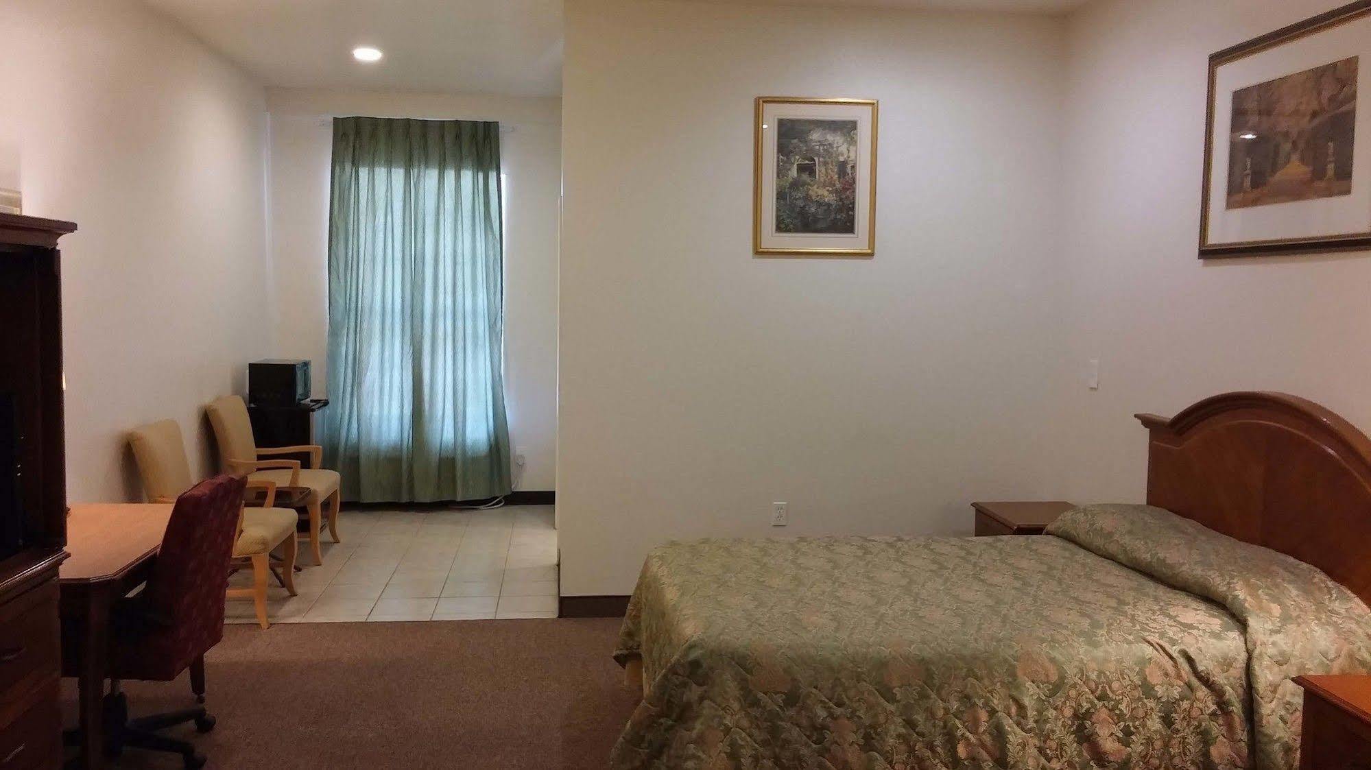 Country Regency Inn & Suites Manvel Exterior foto